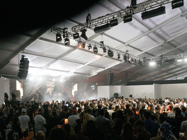 A crowd at an evening performance