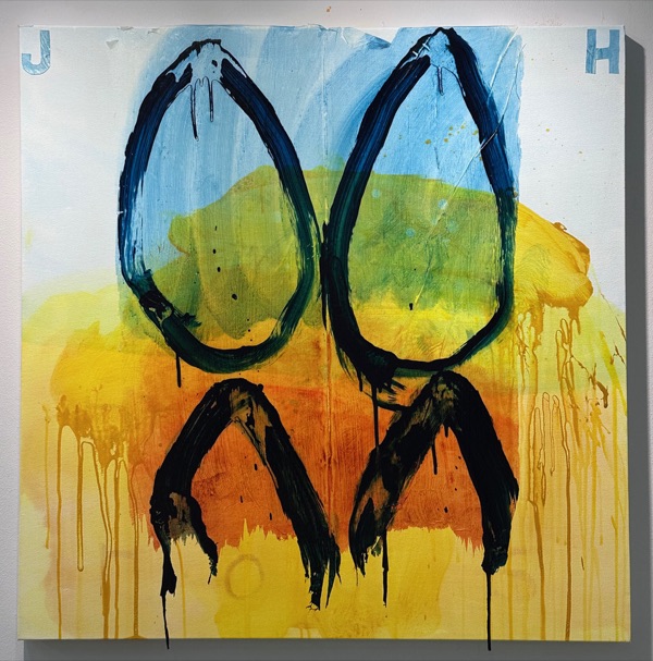A painting of two dark teardrop shapes over washes of yellow, orange and blue