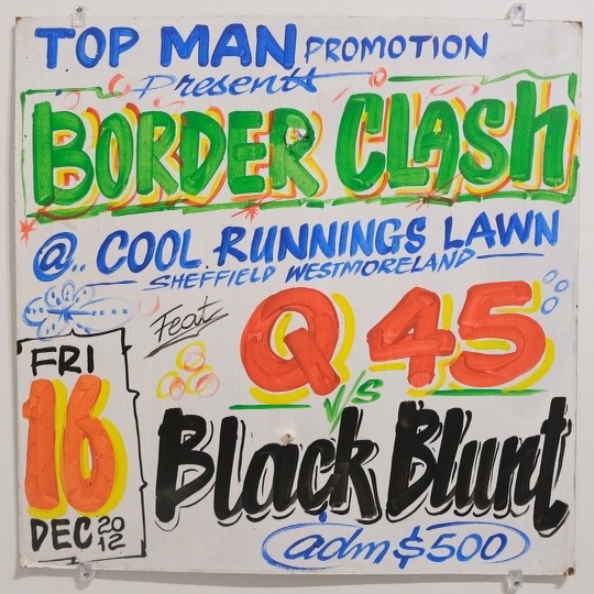 A Border Clash sign with Q45 and Black Blunt at Cool Runnings Lawn