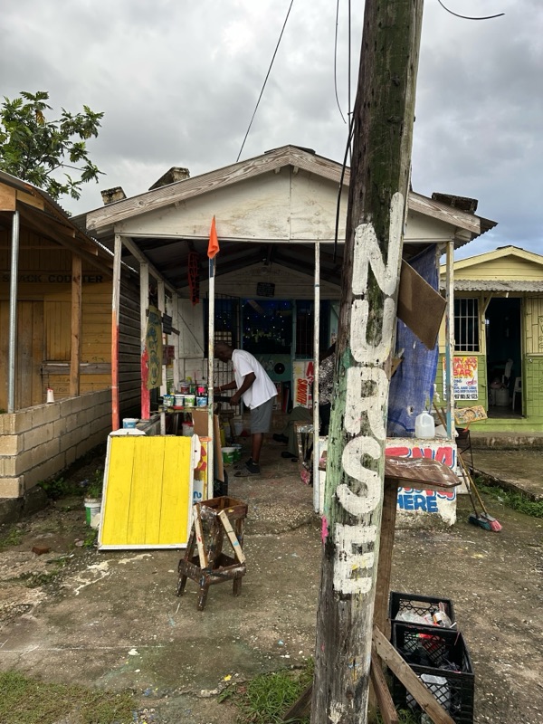 The front of Nurse’s shop, with his name painted down a wooden post