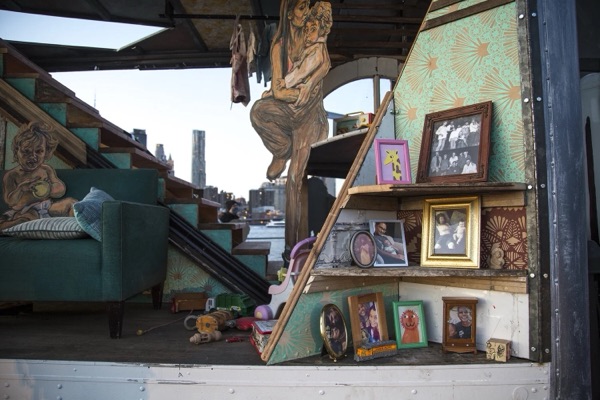 A close view of the sculpture’s painted interior and carved wooden details