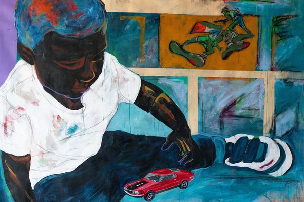 Hot Wheels by Emmanuel Gillespie: a painting of a boy in a paint-flecked white T-shirt sitting on the floor and reaching toward a red toy car, in front of a wall of colourful panels