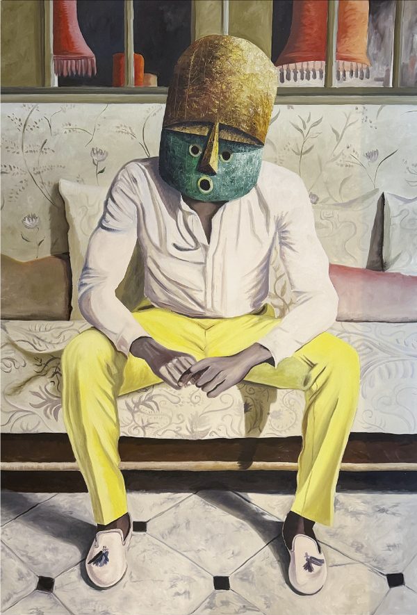 Veve by Sébastien Royez: a man in a white shirt and yellow trousers sits on a floral sofa wearing a large green and gold carved mask