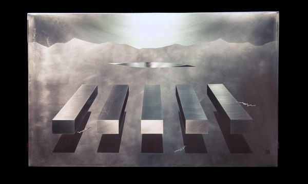 The Five, a polished stainless steel wall piece: five bars float above their shadows, under a bright glow and a ridge of mountains